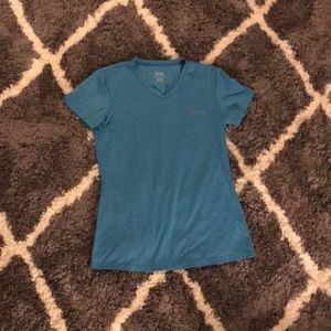 Blue v-neck Reebok athletic top:))